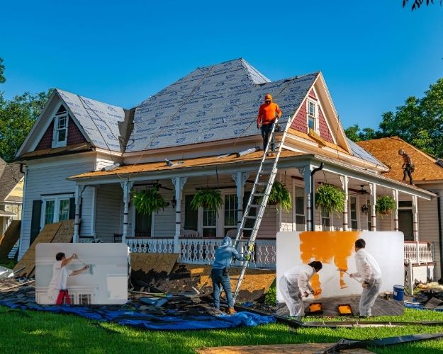 Professional painters working on a home painting project in Patna